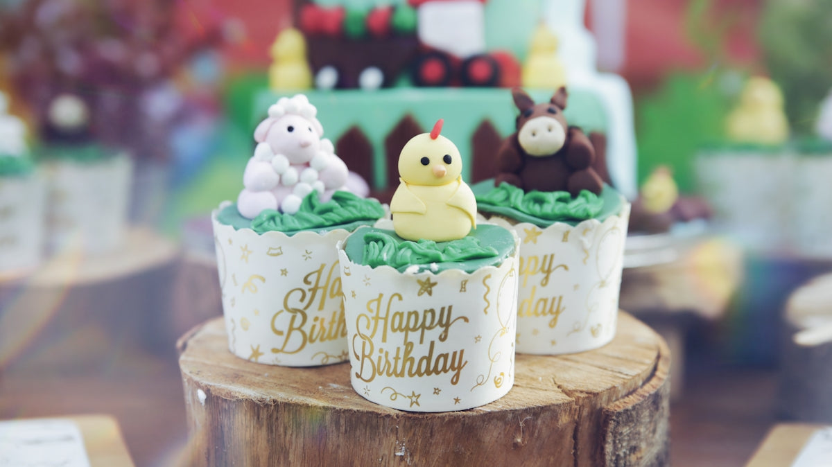 happy birthday cake on brown wooden table