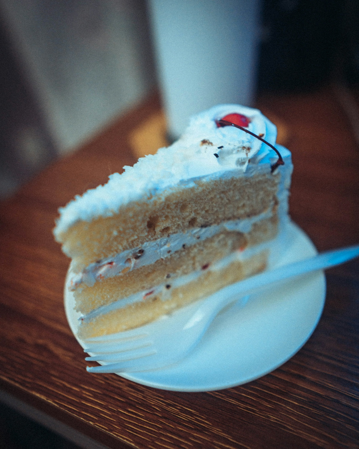 a piece of cake sitting on top of a white plate