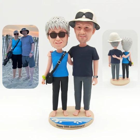 Personalised Beach-themed anniversary couple with hats or sunglasses Figurines; example sculpture