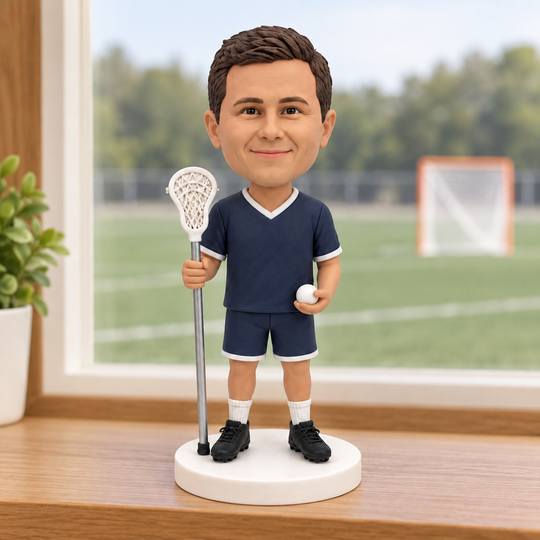 Custom lacrosse player figurine displayed beside field window