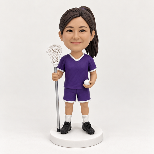 Custom female lacrosse player figurine in purple uniform