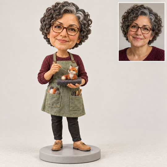 AI-generated illustrative example of a custom needle felting artist bobblehead holding a felting pad and fox, with a matching fictional human portrait.