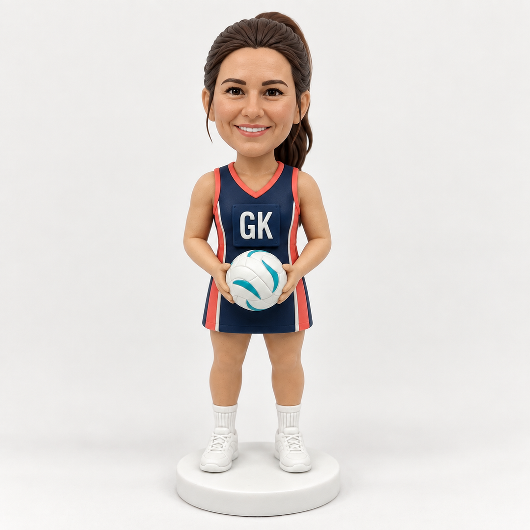 Custom netball bobblehead coral navy GK outfit