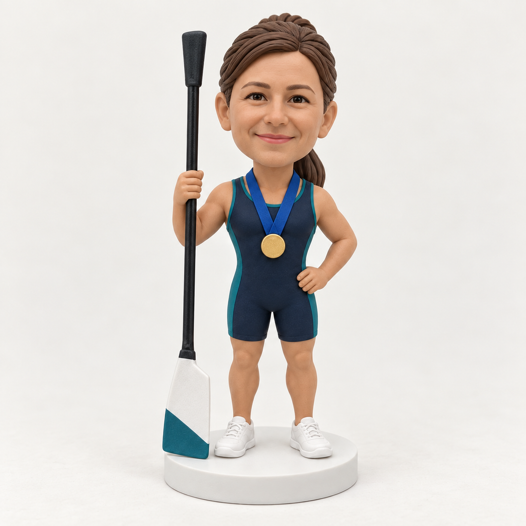 Personalised female rower bobblehead example in navy kit