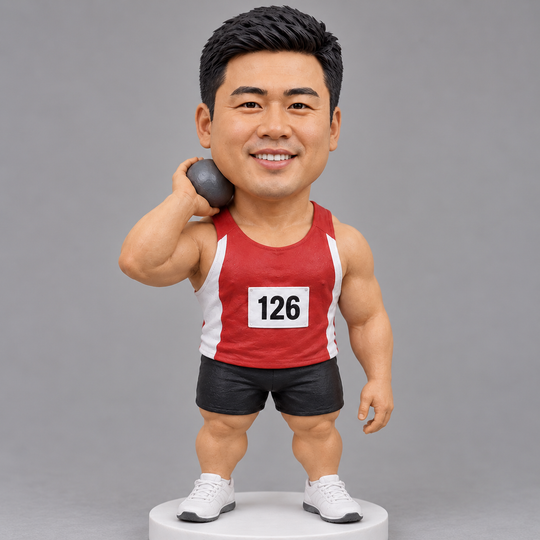 Shot put bobblehead face and shot detail