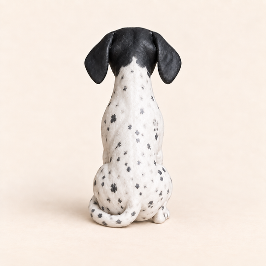 Illustrative rear view of a custom German Shorthaired Pointer polymer clay figurine.