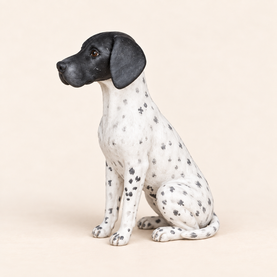 Illustrative side view of a custom German Shorthaired Pointer polymer clay figurine.